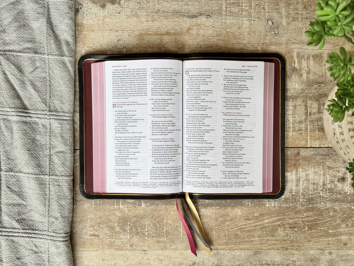 Black Loch Ness NKJV Large Print Thinline Reference (Premier Collection) by Rock Wall Bibles, open to the text
