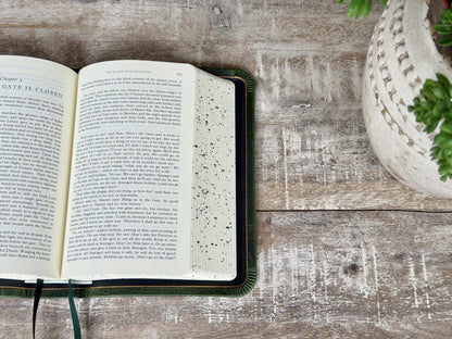 Emerald Waxy “The Lord of the Rings” by Rock Wall Bibles, open to the text, side view