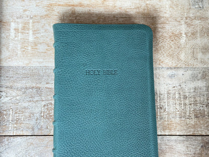 Turquoise Minerva Box NIV Thinline Reference (Premier Collection) by Rock Wall Bibles, front cover close-up