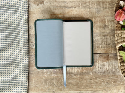 Turquoise Minerva Box NIV Thinline Reference (Premier Collection) by Rock Wall Bibles, inside cover liner